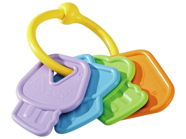 A set of colourful chewable plastic keys to give to a teething infant